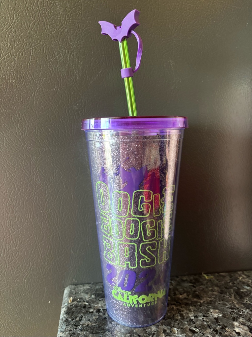Disneyland Oogie Boogie Bash cup with bat straw cap and light up poison apple